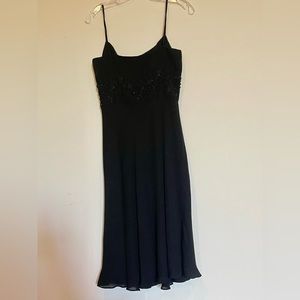 Vintage Ann Taylor black cocktail dress. Very flattering and
